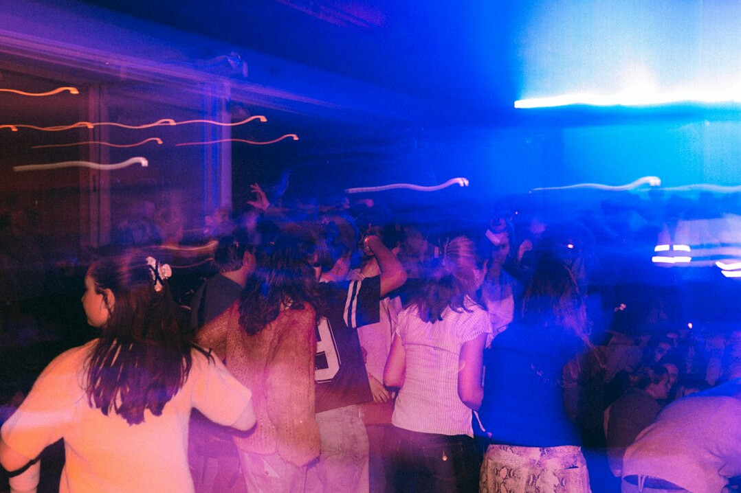 Older adults dancing together at a senior social club